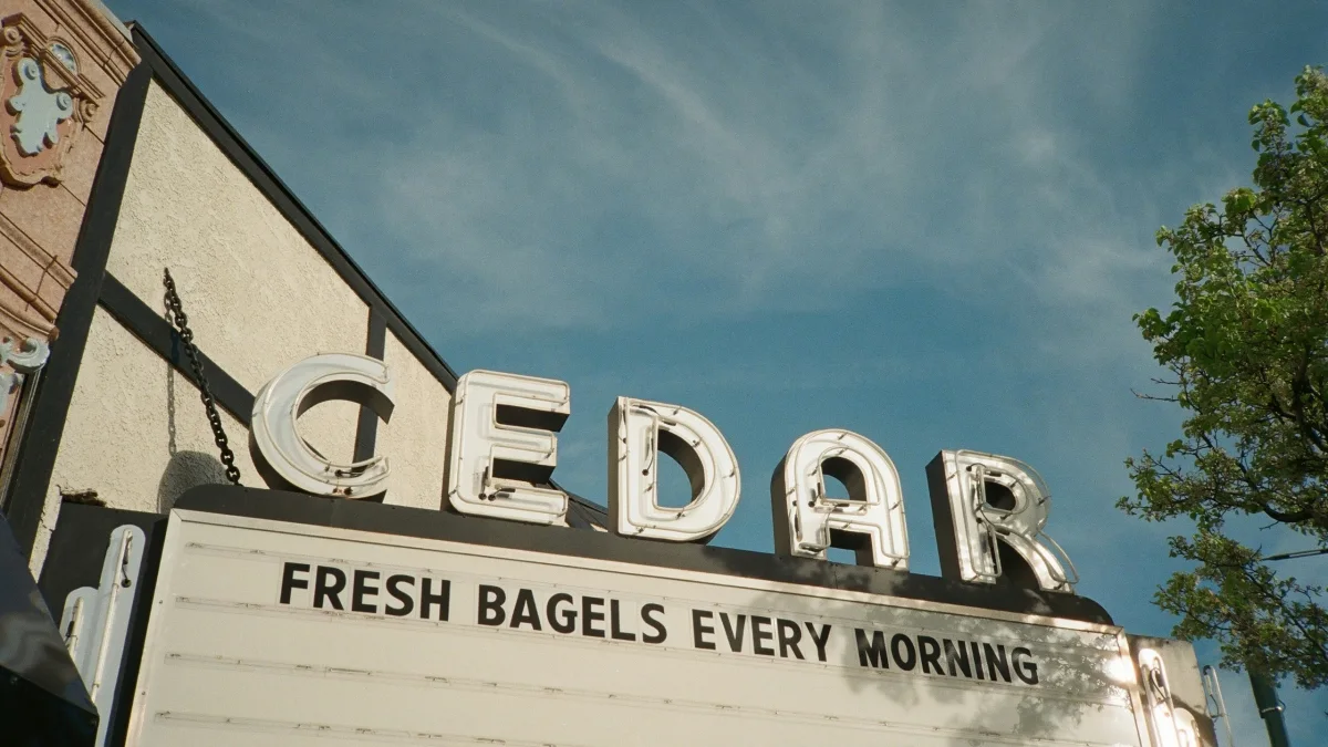 Bakery sign reading FRESH BAGELS EVERY MORNING